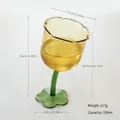 Handcrafted tulip flower shaped creative glass wine goblet with green stem and petal base - Floral Bent Stem Glass / 250ML