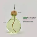 Elegant green teardrop glass vase specifically for avocado seed hydroponics growth - Green Avocado Vase (Teardrop Style)