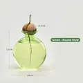 Round green glass vase specifically designed for avocado seed hydroponic growth and decor - Green Avocado Vase (Round Style)