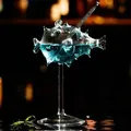 Creative pufferfish shaped glass cocktail goblet filled with vibrant blue liquid and straw - Pufferfish Goblet