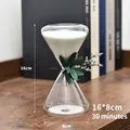 Glass hourglass timer with white sand and dried flower decor, 30 minutes duration - Triangle Style With Flowers - White Sand - 30 Min / 8x16cm