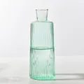Elegant close-up of a green vertical ribbed glass vase for nordic style home decor - Green Large Ribbed Style