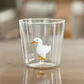 Cute minimalist clear glass cup with a 3D white duck figurine inside for juice - 201-300ml / Standing Swan Style / Clear