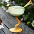 Ins style minimalist glass dessert cup featuring a light green bowl and unique amber wavy stem - Bee High-Footed Cup / Jade and Topaz