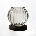 Elegant round ribbed glass candle holder with dark wooden base stand for home decor - Striped / Gray