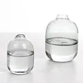 Set of two minimalist Nordic smoky grey glass vases with elegant round capsule shape - Type A Set