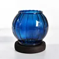 Elegant blue ribbed glass candle holder with dark wooden base for home decor - Striped / Blue