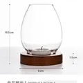 Minimalist egg-shaped glass candle holder with round wooden base and dimensions. - Egg Shaped Transparent (zt2035) / Egg Shape