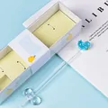 Handcrafted elegant glass dip pen set featuring a cute blue duck character and matching pen rest - Gaga Light Blue Duck