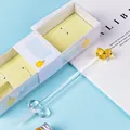 Handcrafted creative yellow duck glass dip pen gift set with a clear glass pen rest - Gaga Yellow Duck