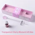 Geschenkset mit Glasfeder im Kirschblütendesign, Tintenfass und Federhalter in Box - Transparenter Stift Kleine Geschenkbox / 1 Stift + 1 Tinte + 1 Ablage / Rosa