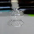 Reposaplumas de vidrio transparente con un diseño minimalista de doble esfera - Soporte de Doble Esfera