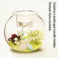 Creative glass landscape candle holder featuring green sand and white floral decor - M