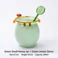 Green glass honey jar with bee ornament and lemon shaped stirrer, capacity 390ml - 390ml / Green Small Honey Jar With Green Lemon Stirrer