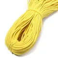 Close-up detail of bright yellow elastic cord, flexible threading rope for DIY crafts and garments. - 10 Yards/Pack (3mm) / Yellow