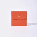 Small vibrant orange jewelry storage pouch with gold snap button closure for earrings - Orange / 8x8cm