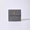 Small grey pebbled texture jewelry storage pouch with a single gold snap button closure - Dark Gray / 10x10cm