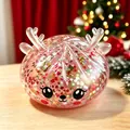 Gros plan d'un jouet anti-stress en forme de renne festif avec des paillettes colorées. - Rose