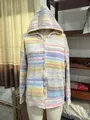 Full view of the colorful striped knit cardigan on a mannequin showing zipper and pockets - XS / Tops / Multicolor