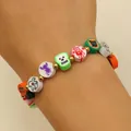 Handmade Halloween beaded bracelet featuring colorful skull ghost and spider charms for parties - Ghost Pumpkin Polymer Clay Beaded Style (2180) / Colorful