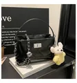 Black quilted bucket bag with chain strap and cute bear pendant, classic vintage design. - With Charm / Black