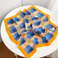 Cotton printed square scarf detailed shot showing geometric check pattern and orange border - Orange