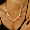 Elegant double-layer gold chain pearl necklace with red cherry and heart pendants - Double Layer Artificial Pearl Cherry Tassel Necklace (4653)