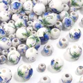 Perline in ceramica stile porcellana blu e bianca floreali fatte a mano per gioielli - Set da 30 / Peonie blu oro / 6mm