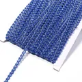 Close-up detail of blue and silver ric rac wave trim ribbon wound neatly on a cardboard card. - 0.5cm Wide 25 Yards/Pack / Sapphire Blue