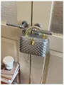 Silver studded vanity handbag with top handle and gold chain crossbody strap for women. - Silver