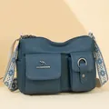Soft leather shoulder bag with multi pockets and vintage woven strap for women daily use. - Blue