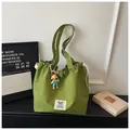 Casual green checkered canvas tote bag with drawstring closure and decorative charm - With Pendant / Green