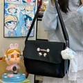 Black canvas messenger bag for women, large capacity casual crossbody shoulder bag with cute pendant. - With Pendant / Black