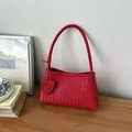 Red woven leather underarm shoulder bag with elegant minimalist design for women's fashion. - Red