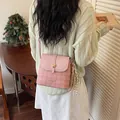 Elegant pink plaid crossbody bucket bag featuring a decorative gold heart clasp - Basic Style / Pink
