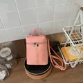 Pink minimalist crossbody bucket bag for women, summer 2026 trendy small shoulder phone bag. - Pink