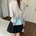 Powder blue leather bucket bag with cute rabbit charm for daily office commute - Blue With Pendant