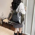 Grande borsa tote in PVC nero trasparente con pochette interna e patch logo tondo - Nero