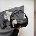 Black woven cylinder shoulder bag with pearl heart pendant, stylish casual daily handbag for women. - Black (With Pendant)