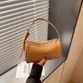 Brown woven cylindrical handbag, stylish intrecciato shoulder bag and chic crossbody purse. - Khaki