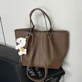 Brown faux leather tote bag with cute charm, large capacity for daily commuting. - Tote Bag Set (Includes Pouch & Charm) / Brown