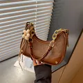 Elegant brown crescent moon shoulder bag with gold chain and flower charm accessory. - With Pendant / Brown
