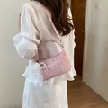 Elegant pink plaid shoulder bag with delicate white lace and pearl charm accents - With Charm / Pink