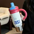 Large capacity stainless steel insulated tumbler with handle straw lid stylish water bottle - White