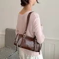 Vintage dark brown cylinder shoulder bag for women, retro simple underarm pillow bag style - Brown