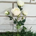 Detailed view of artificial white rose branch with green leaves, perfect for home decor display. - Brushed Fabric Cream White