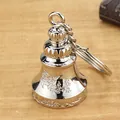 Silberfarbener Metallglocken-Schlüsselanhänger mit Retro-Muster, chinesischer Autohänger. - Silber