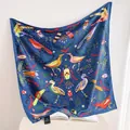 Women's 90cm square silk scarf featuring vibrant botanical, bird and insect prints for spring. - Blue