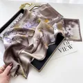 Elegant silk scarf with artistic floral print, versatile long ribbon design for women. - 19203-Main Image