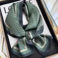 Green silk ribbon scarf for women, elegant floral and geometric print, stylish spring accessory. - 19216-Main Image